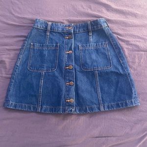 Denim skirt with buttons down the middle.